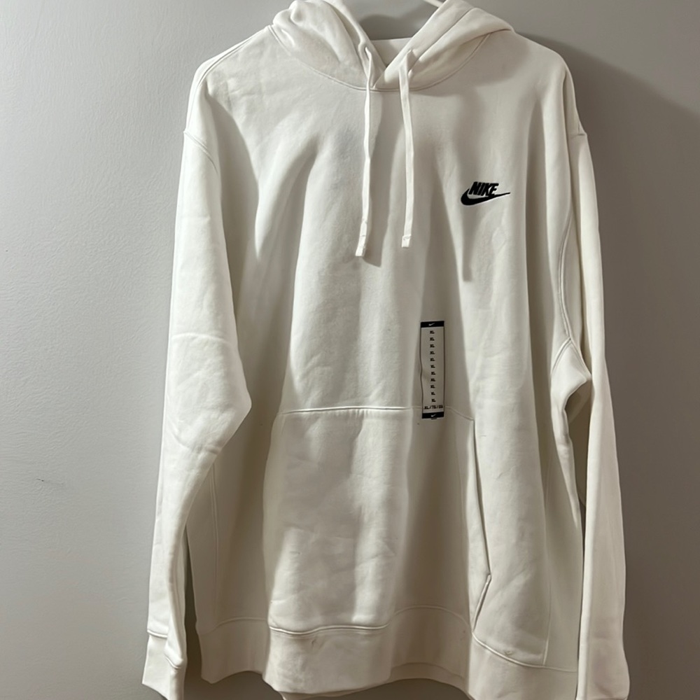 white nike hoodie, tags still on, size XL.